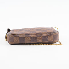 Louis Vuitton Mini Pochette Damier Ebene Louis Vuitton Mini Pochette Damier Ebene