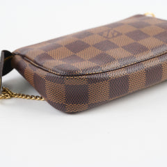 Louis Vuitton Mini Pochette Damier Ebene Louis Vuitton Mini Pochette Damier Ebene