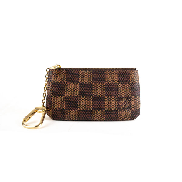 Louis Vuitton, a 'Pochette Félicie' monogram vanvas handbag and a  'Multicles' Damier Ebene key holder, 2020-21. - Bukowskis