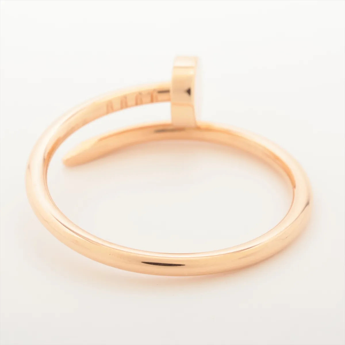 Rose gold ring on a light 