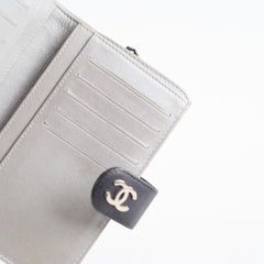 Chanel Camelia Embossed Lambskin Bi-Fold Wallet Black