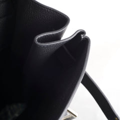 Close-up of a black leather product 