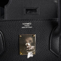 Close-up of a black Hermès bag 