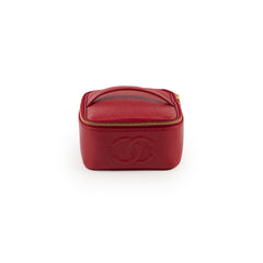 Red cosmetic case with Chanel 