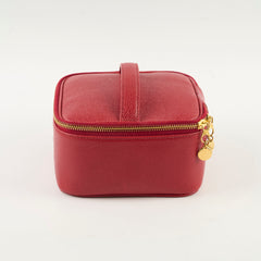 Red jewelry box with a gold zipper 