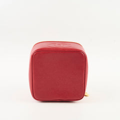 Red rectangular pouch with a gold zipper 