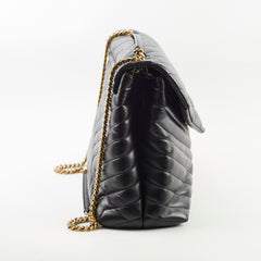 Black quilted handbag with gold chain 
