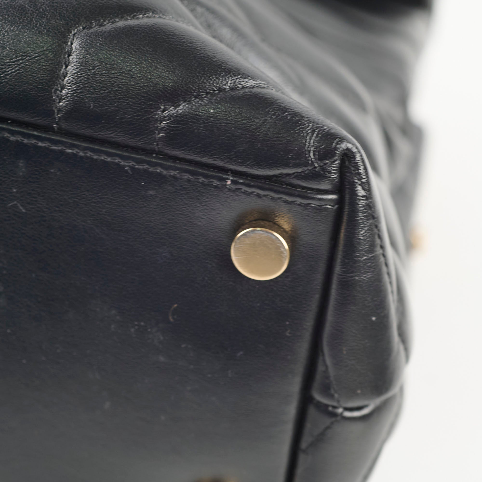 Close-up of a black leather bag with