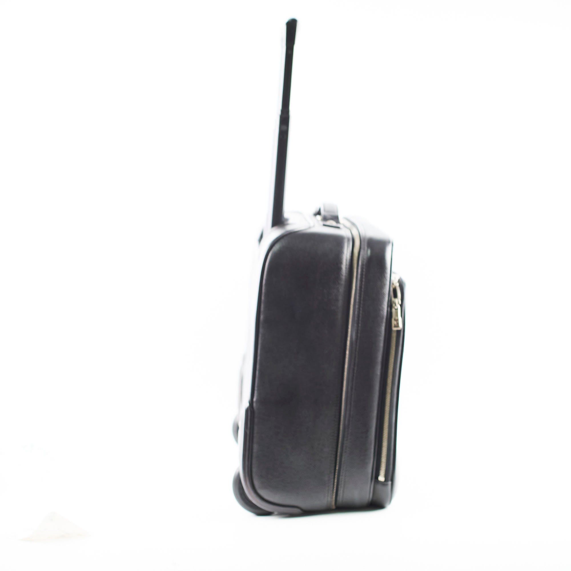 Black suitcase with a handle 
