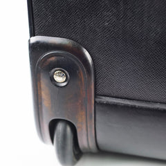 Close-up of a black suitcase handle