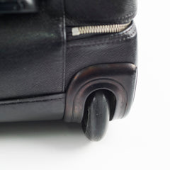 Close-up of a black suitcase wheel 