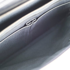 Close-up of a car door panel with a logo 