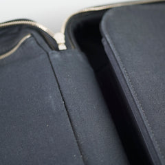 Close-up of a black fabric case with a zipper