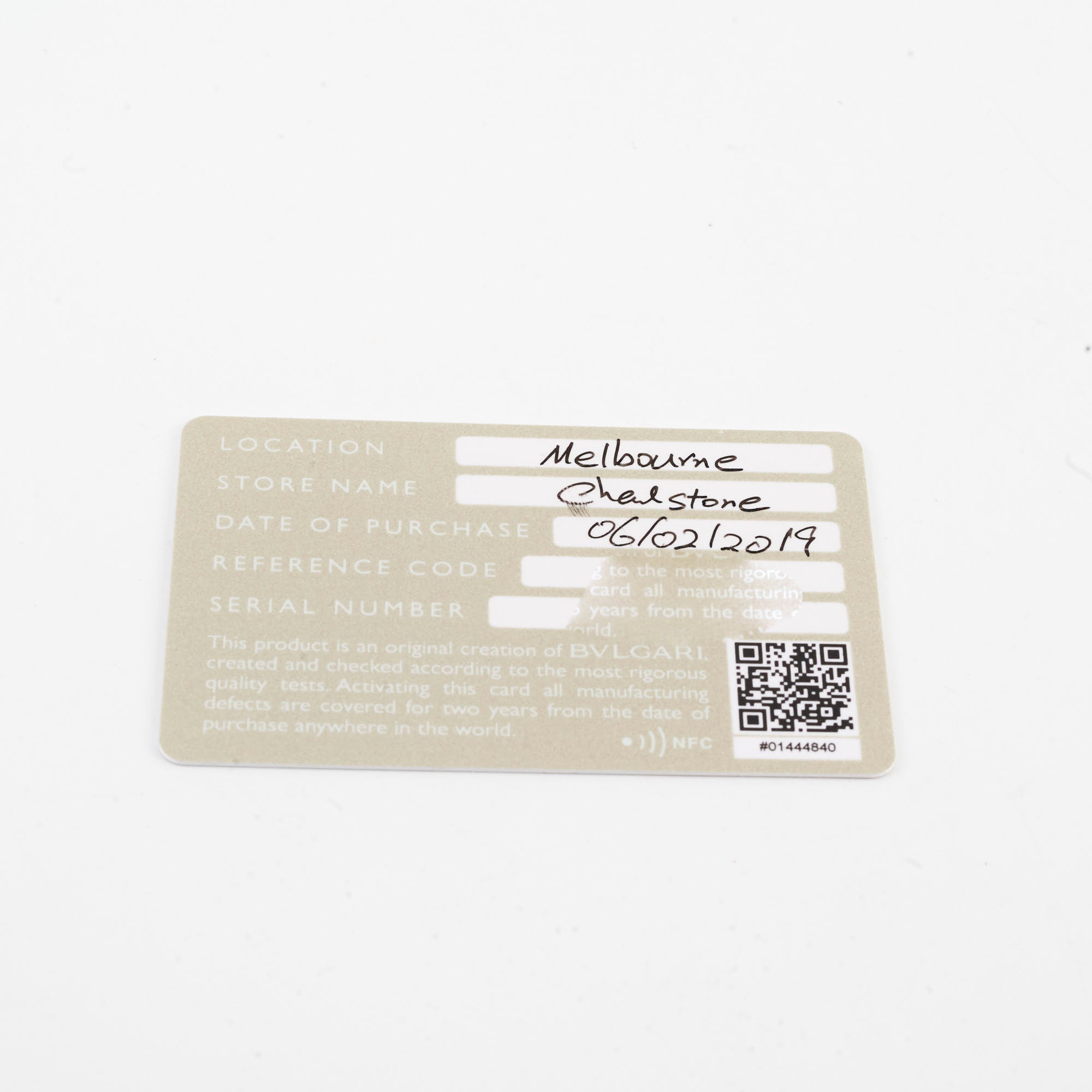 Product label with text and QR code