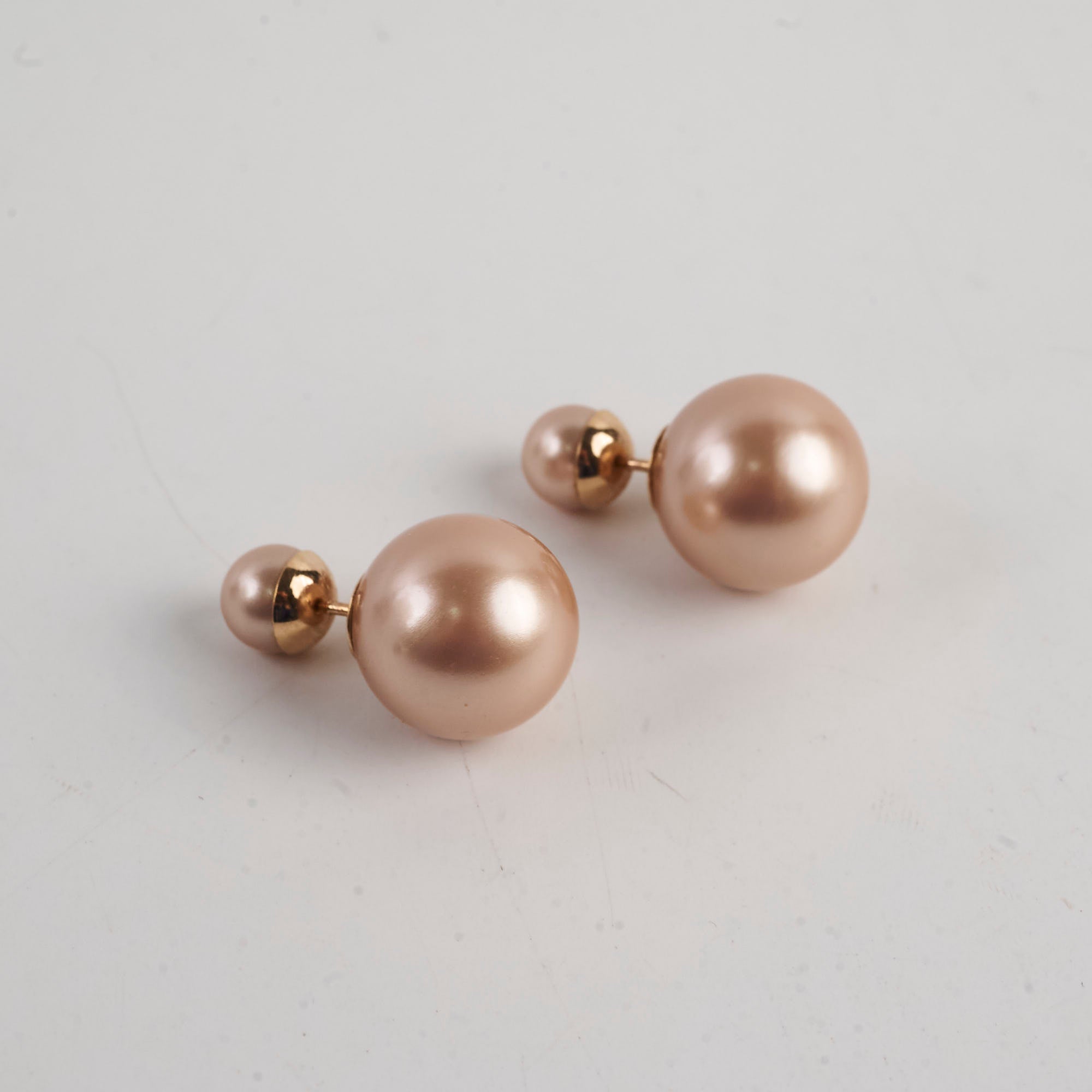 Pair of pearl earrings with gold posts 