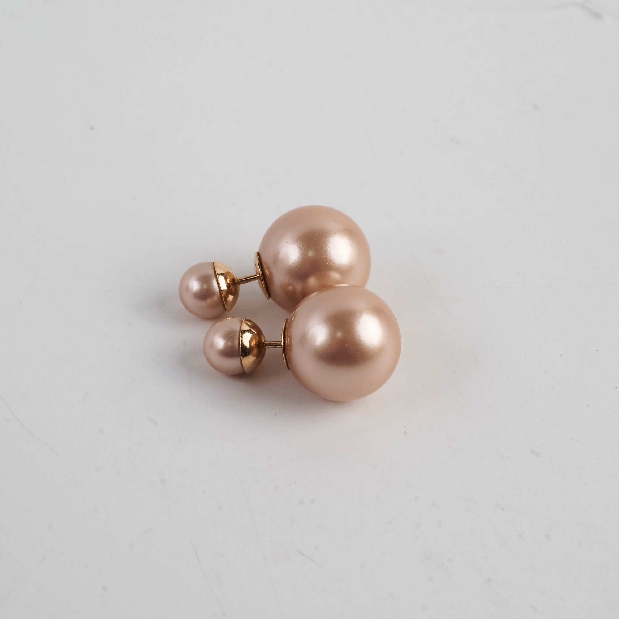 Set of three pearl earrings 