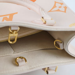 Louis Vuitton On The Go Tote PM Empreinte Orange/Cream