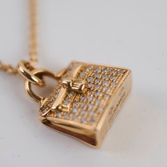 Hermes Amulettes Diamonds Kelly pendant 0.21CT Rose Gold