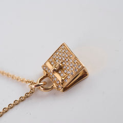 Hermes Amulettes Diamonds Kelly pendant 0.21CT Rose Gold
