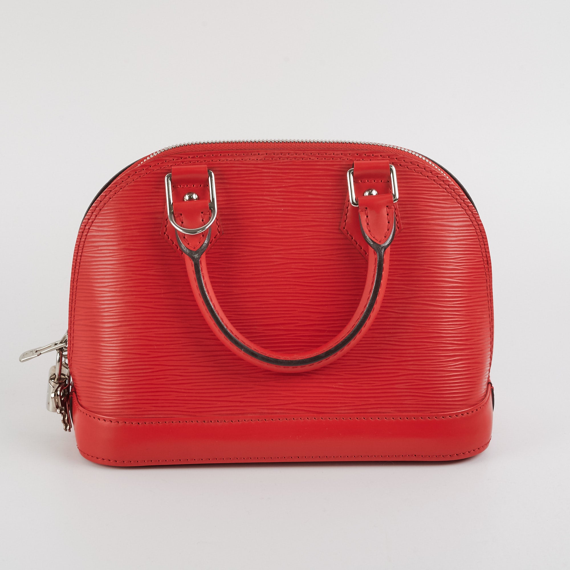 Alma bb leather handbag Louis Vuitton Red in Leather - 35324735