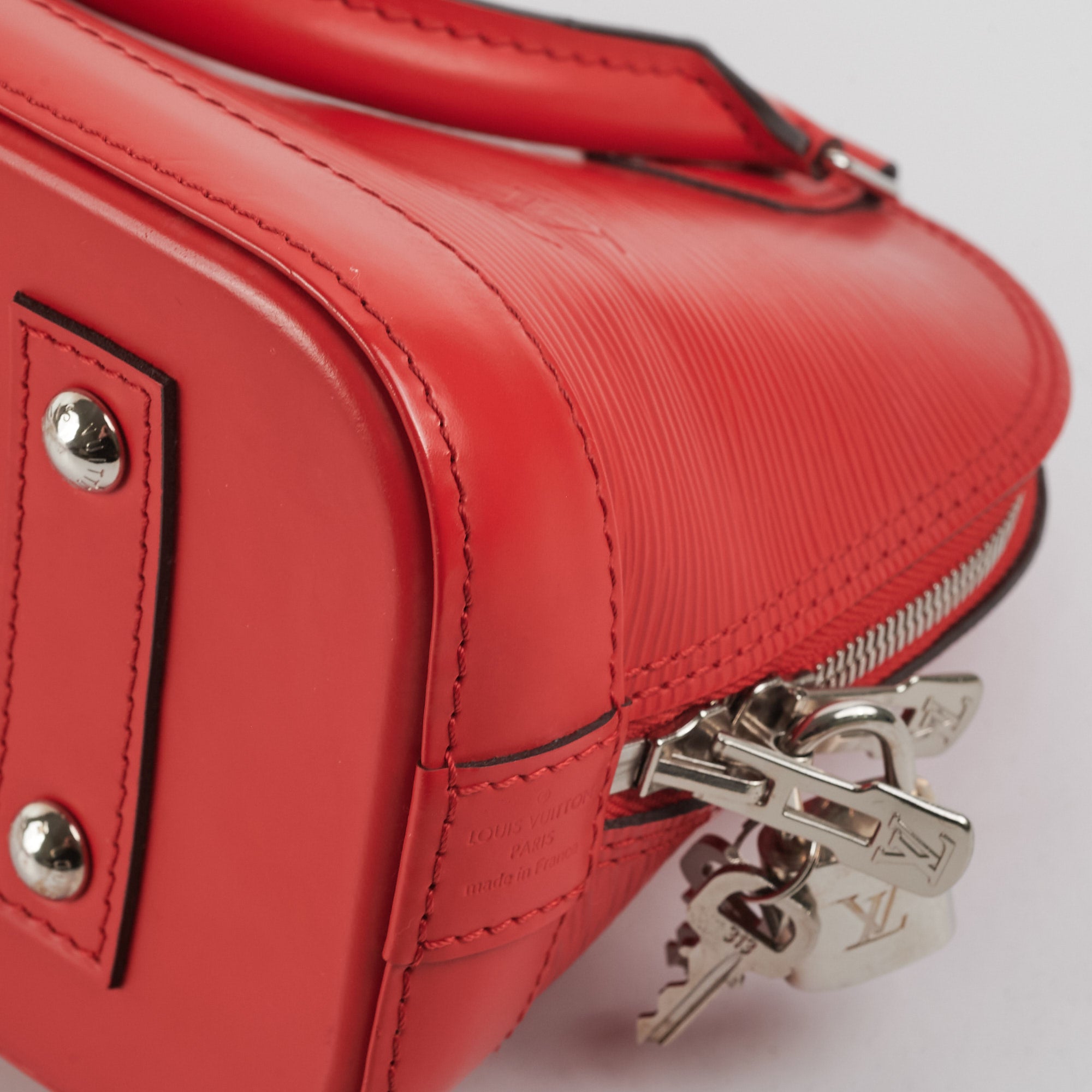 Louis Vuitton Alma BB Handbag in Black & Red – EliteLaza