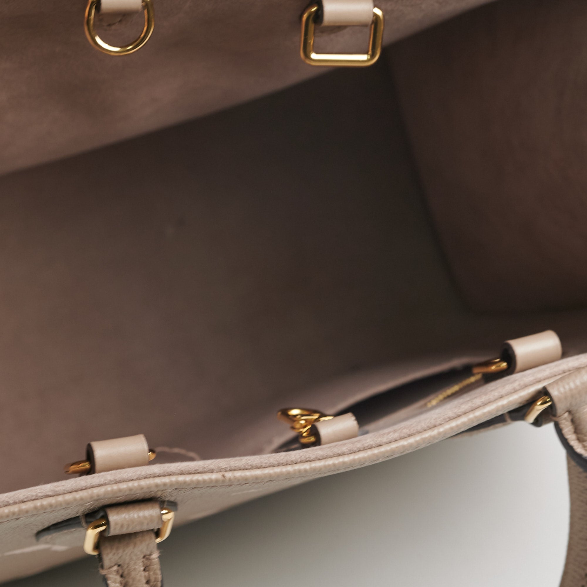 Louis Vuitton Gris Tourterelle Monogram Giant Empreinte Leather Trianon MM  NM Bag - Yoogi's Closet