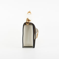 ITEM 27 - Christian Dior J'adior White Flap Bag