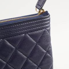 Chanel Caviar Boy Large O-Case Navy