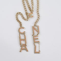 Chanel Gold/Crystal CHA-NEL Rainbow Logo Necklace Light Gold Necklace Costume Jewellery