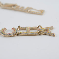 Chanel Gold/Crystal CHA-NEL Rainbow Logo Necklace Light Gold Necklace Costume Jewellery