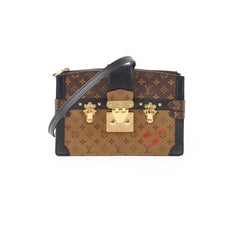Louis Vuitton Monogram Reverse Trunk Clutch Bag