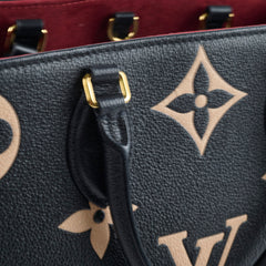 Louis Vuitton OnTheGo MM Bicolour Monogram Empreinte Black Cream