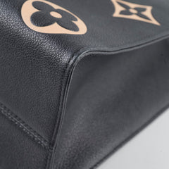 Louis Vuitton OnTheGo MM Bicolour Monogram Empreinte Black Cream