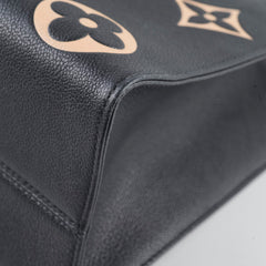 Louis Vuitton OnTheGo MM Bicolour Monogram Empreinte Black Cream