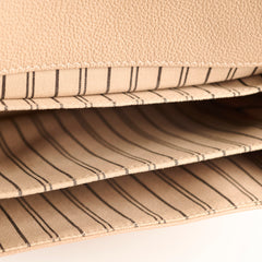 Louis Vuitton Pochette Metis Empreinte Beige