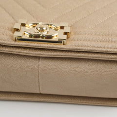 Chanel Medium Boy Caviar Champagne Gold