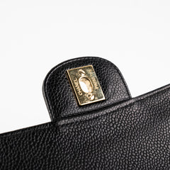 ITEM 17 - Chanel Vintage Classic Medium/Large Black Caviar 24K Gold