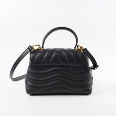 Louis Vuitton Hold Me New Wave bag