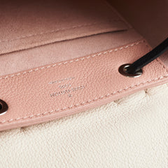 Louis Vuitton Lock Me Backpack Light pink/cream