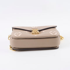 Louis Vuitton Pochette Metis East West Empreinte Tourterelle/Creme