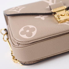 Louis Vuitton Pochette Metis East West Empreinte Tourterelle/Creme