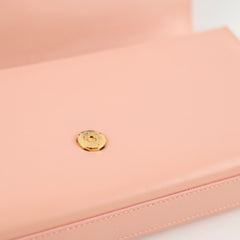 Saint Laurent Cassandre Clutch in Pale Pink Smooth Leather