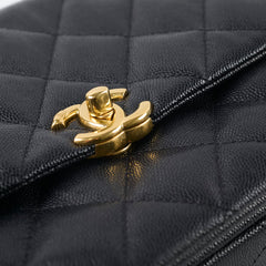 Chanel Caviar 22k Medium Coco First Flap Bag Black Microchip