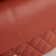 Chanel Medium/Large 24k plated caviar classic flap salmon