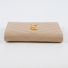 Saint Laurent Cassandre Fragments compact wallet beige
