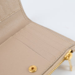 Saint Laurent Cassandre Fragments compact wallet beige