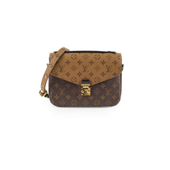 Designer handbag with monogram pattern 