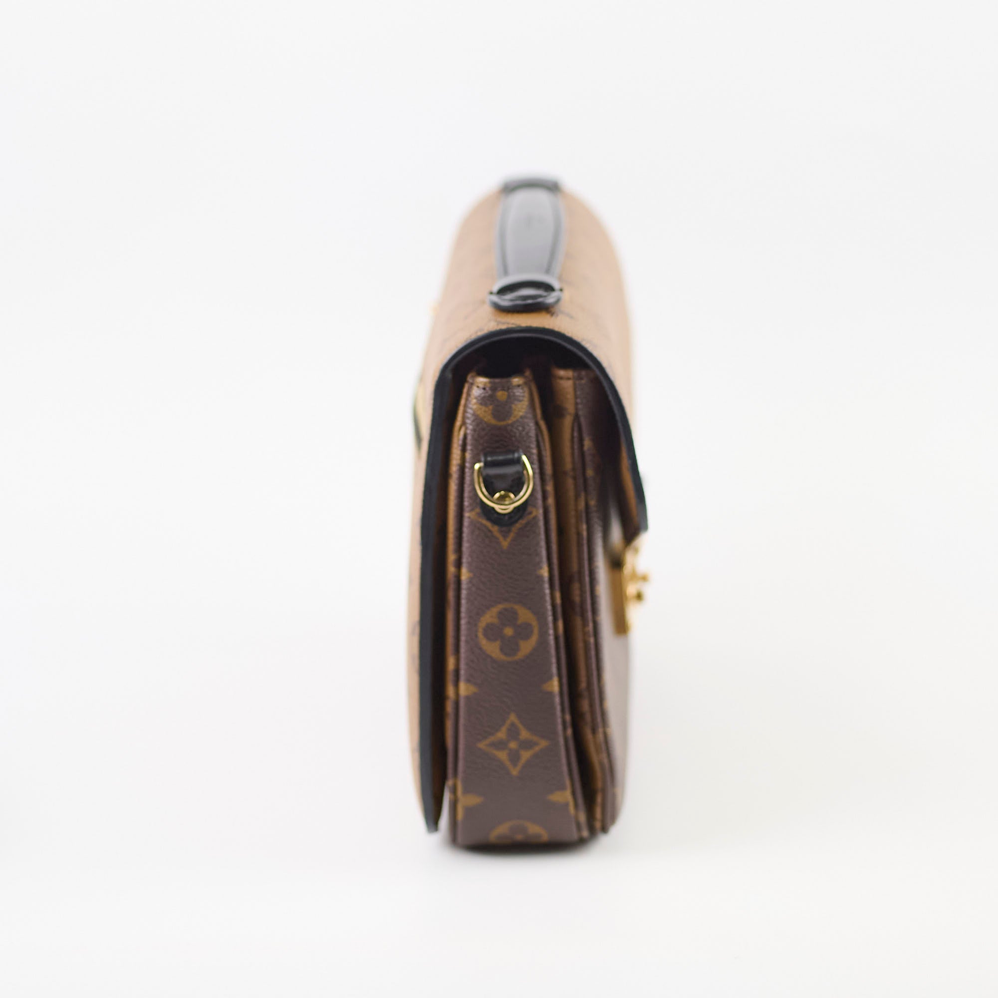 Designer handbag with monogram pattern 