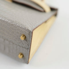 Hermes Mini Kelly Alligator Mississippiensis Gris Perle/Vanilla - U stamp