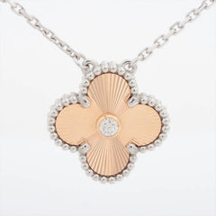 Van Cleef & Arpels Vintage Alhambra 2024 Holiday Pendant Rose Gold Guilloche Diamond Necklace